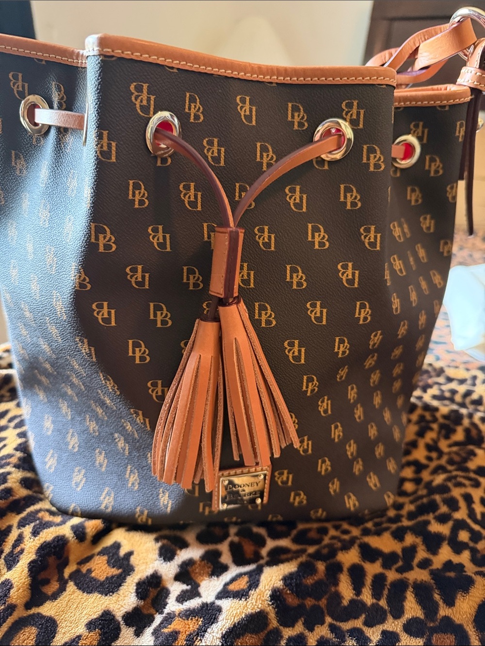 Dooney & Bourke Brown & Tan Logo Tassel Drawstring Bucket Bag